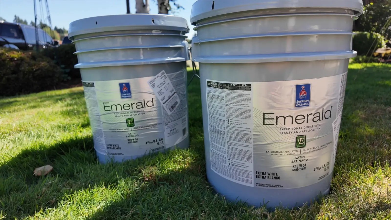Sherwin-Williams Emerald exterior paint buckets on site