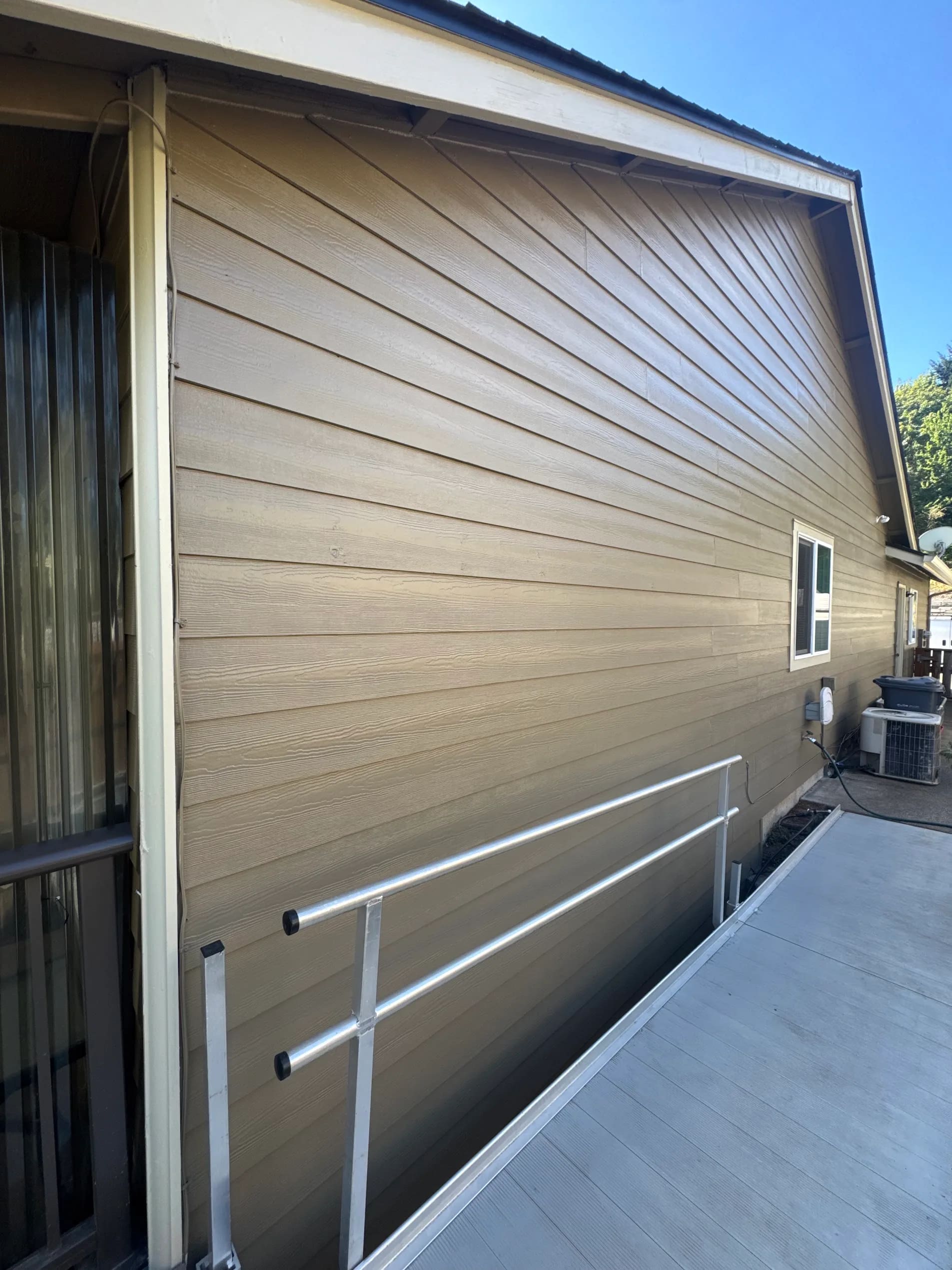 House exterior painted by QC Painting & Renovations