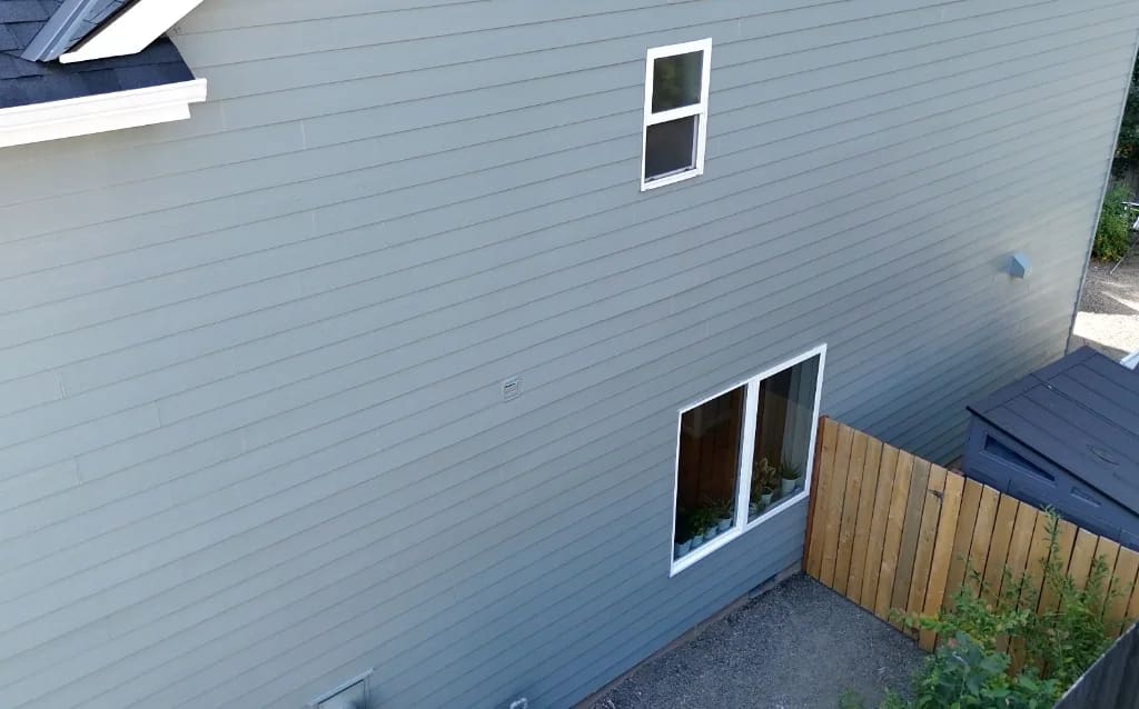 QC Painting siding installation project in Oregon